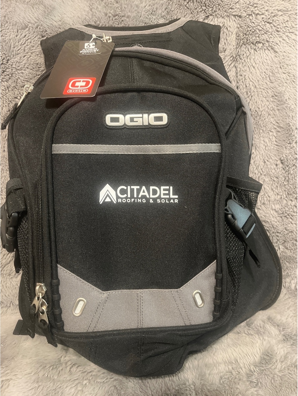 OGIO Black and Gray Backpack with Citadel Roofing & Solar Logo